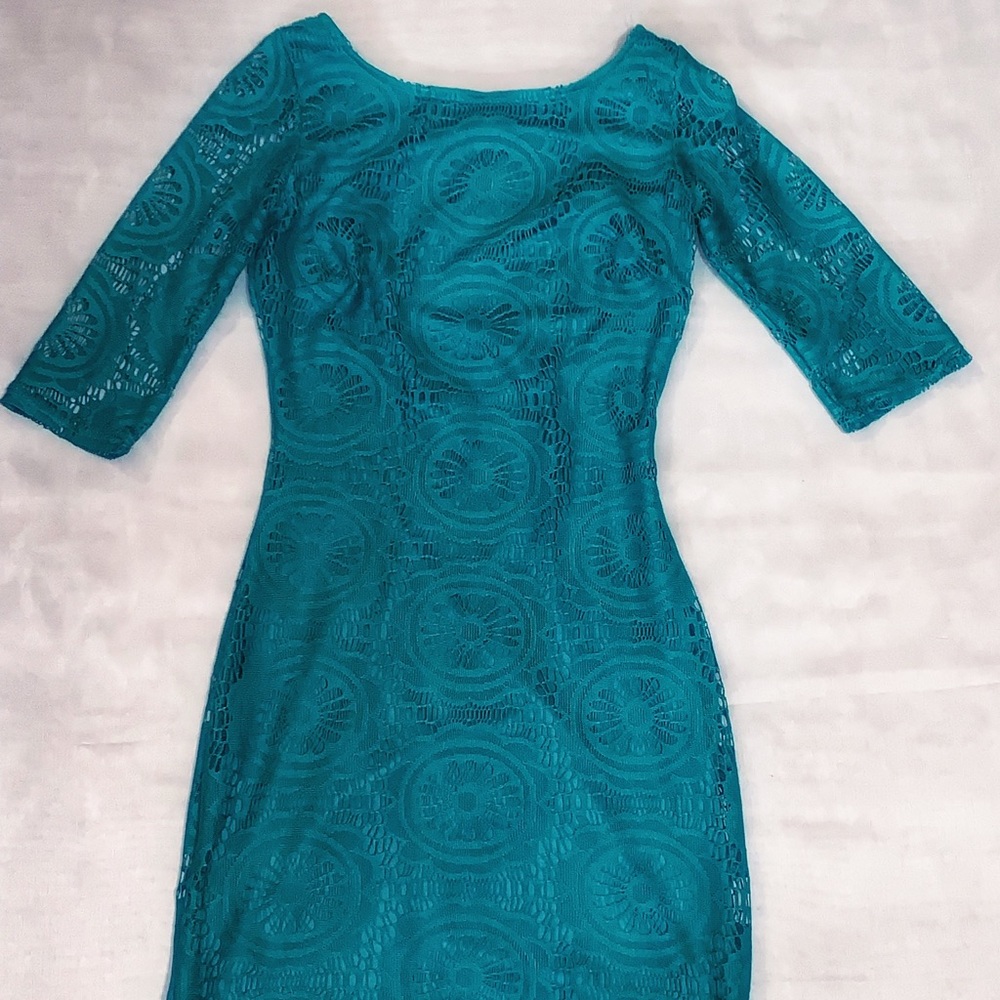 Turquoise mini lace dress.